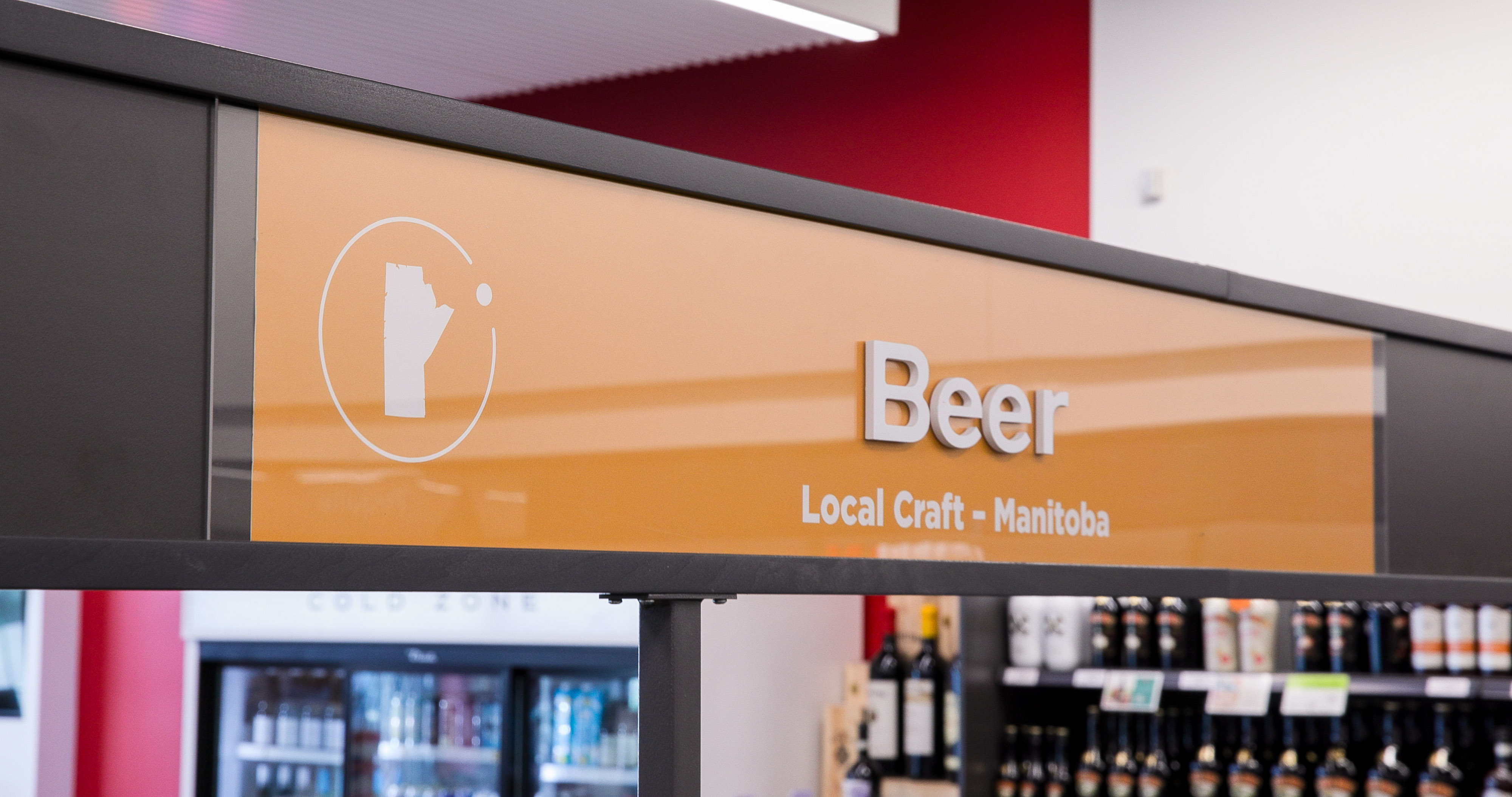 iquor Mart craft beer aisle, Local MB sign